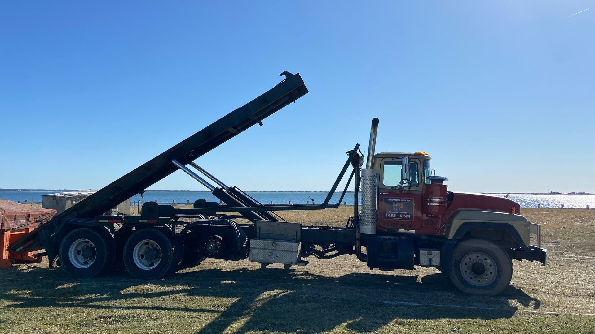A Hamptons Pick Up 25-yard roll-off dumpster on the East End of Long Island