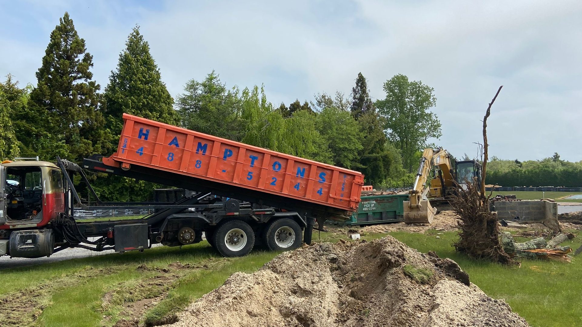 A Hamptons Pick Up 30-yard roll-off dumpster on the East End of Long Island